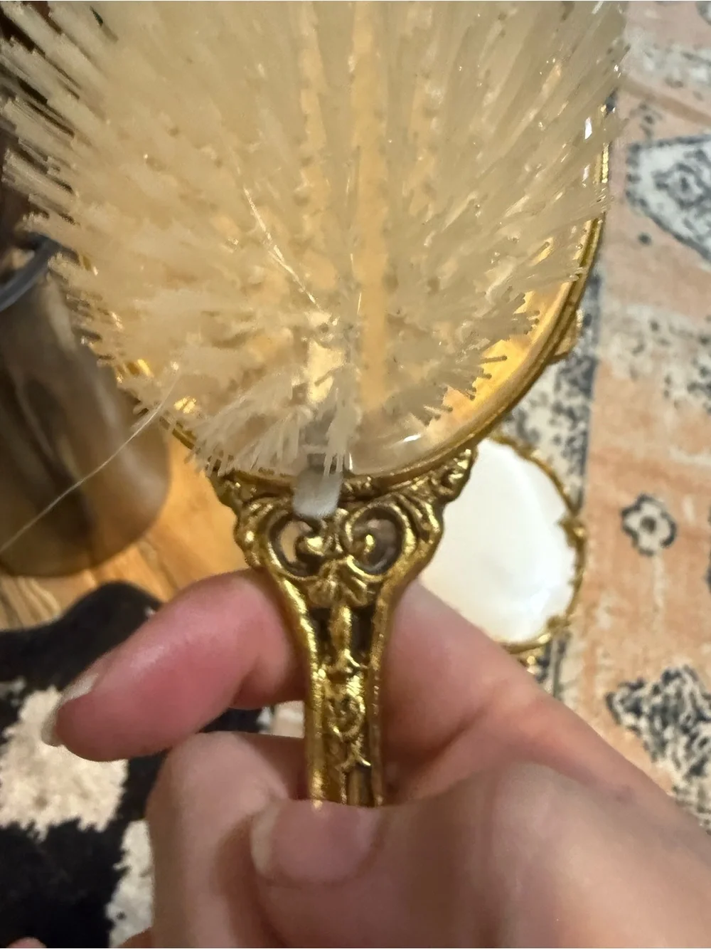 Vintage Hollywood regency ornate Gold Hand Mirror and Brush Set